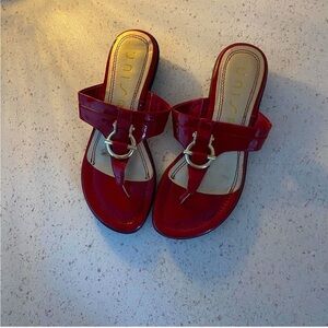 Unisa Glossy Red Sandals with Gold Accents